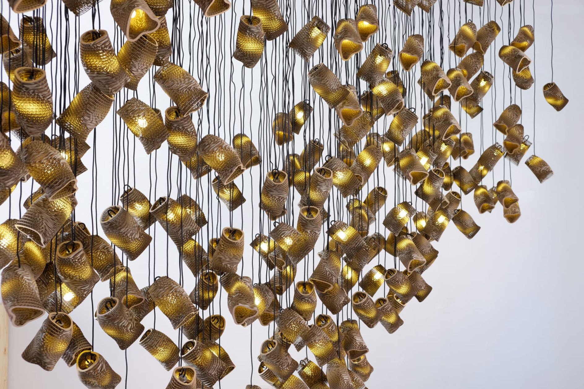 Cardboard murmuration light installation